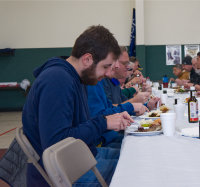 Men_eating_steak_meal